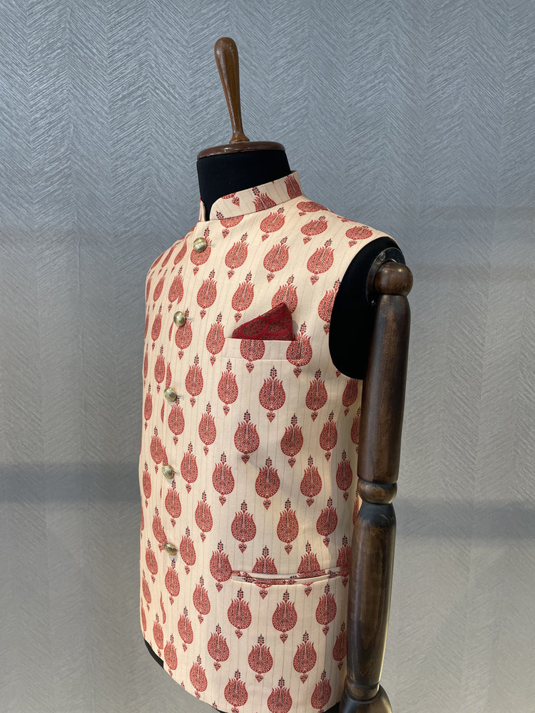 Peach printed Nehru Jacket with red motifs and thin gold stripes